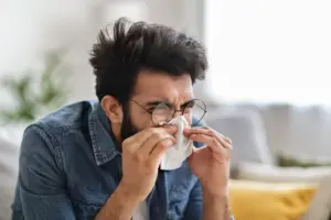 Does blowing your nose make a cold worse?