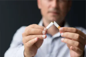 Quitting smoking in midlife may normalise dementia risk within a decade, study finds